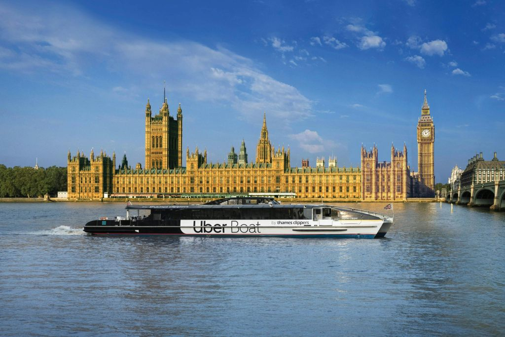 London: Christmas Lights Bus Tour with Audio Guide + One-Way Uber Boat