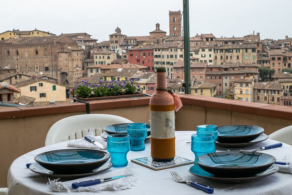 Market Tour and Cooking Class at a Local's Home in Siena