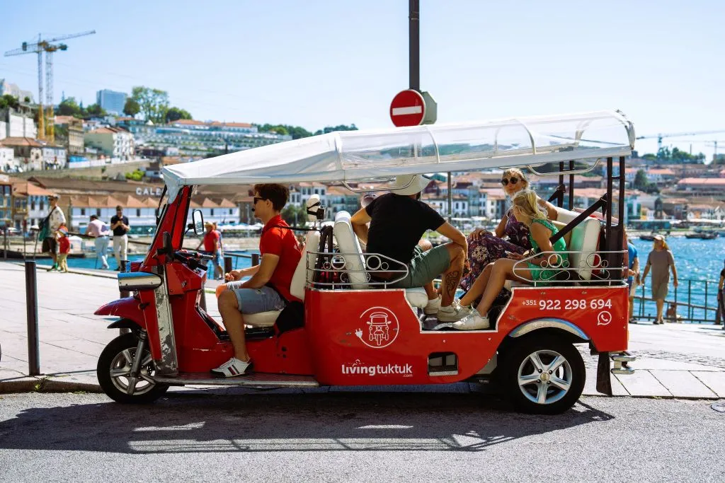 Porto in Sunset: Guided Tuk Tuk City Tour with Wine