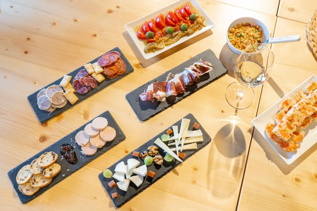 Montserrat: Full Day Tour with Farmhouse Lunch and Winery Visit from Barcelona