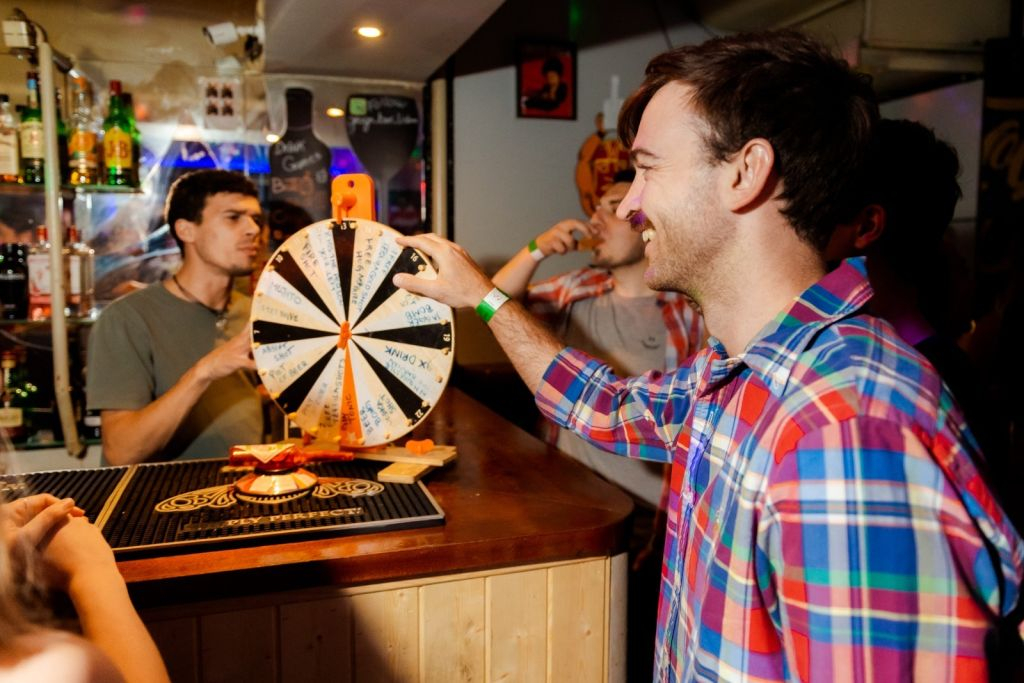 Lisbon: Pub Crawl with Open Bar, Shots, and VIP Club Entry