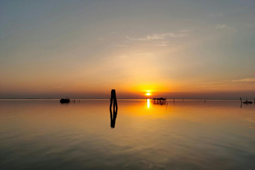Chioggia: Excursión guiada en barco por la laguna veneciana al atardecer