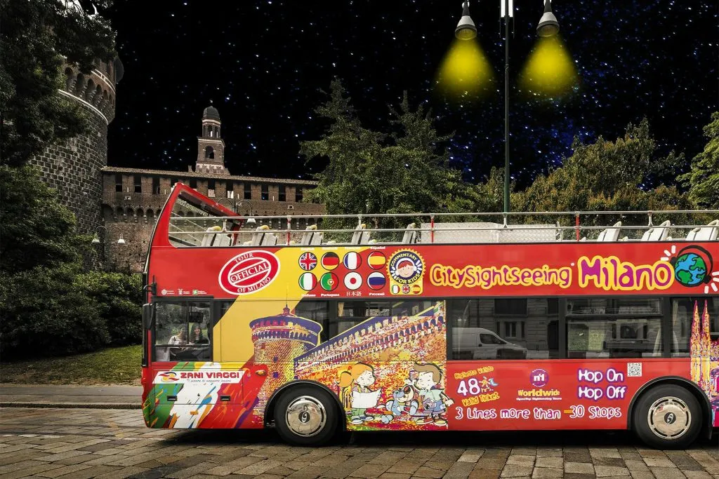 Milan: Open-Top Bus Night Tour + Audio Guide