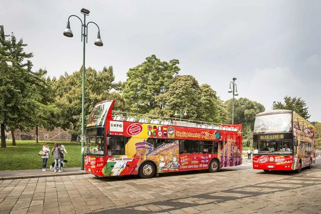 Milan: Open-Top Bus Night Tour + Audio Guide