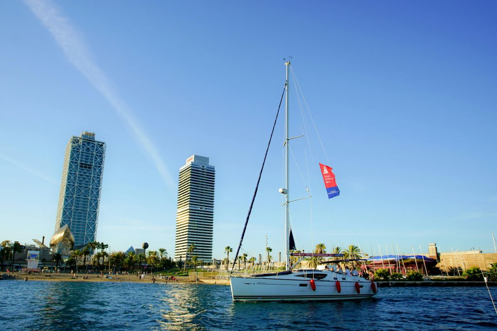 Barcelona: E-Bike Guided Tour, Cable Car & Sailing Experience