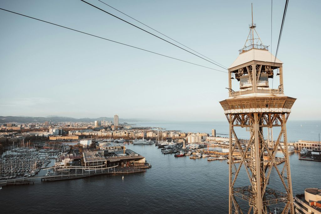 Barcelona: E-Bike Guided Tour, Cable Car & Sailing Experience