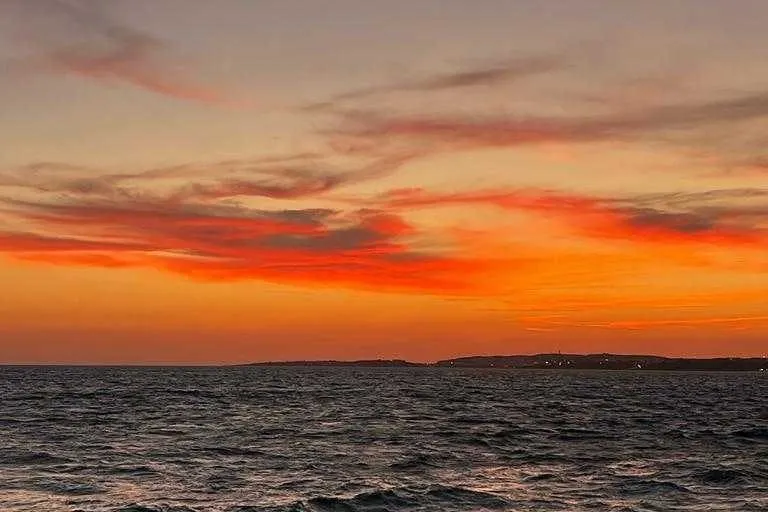 Algarve: Guided Sunset Boat Tour from Vilamoura