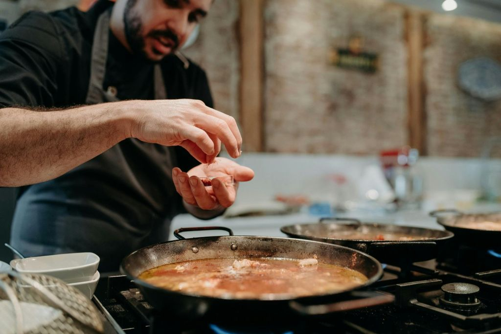 Madrid: Paella & Tapas Cooking Class + Market Visit